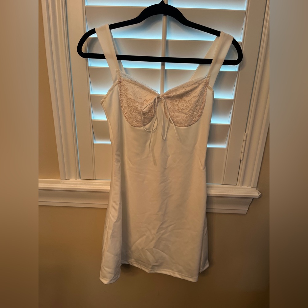 Lace-Trim Ivory Slip Dress with Bow Tie Detail